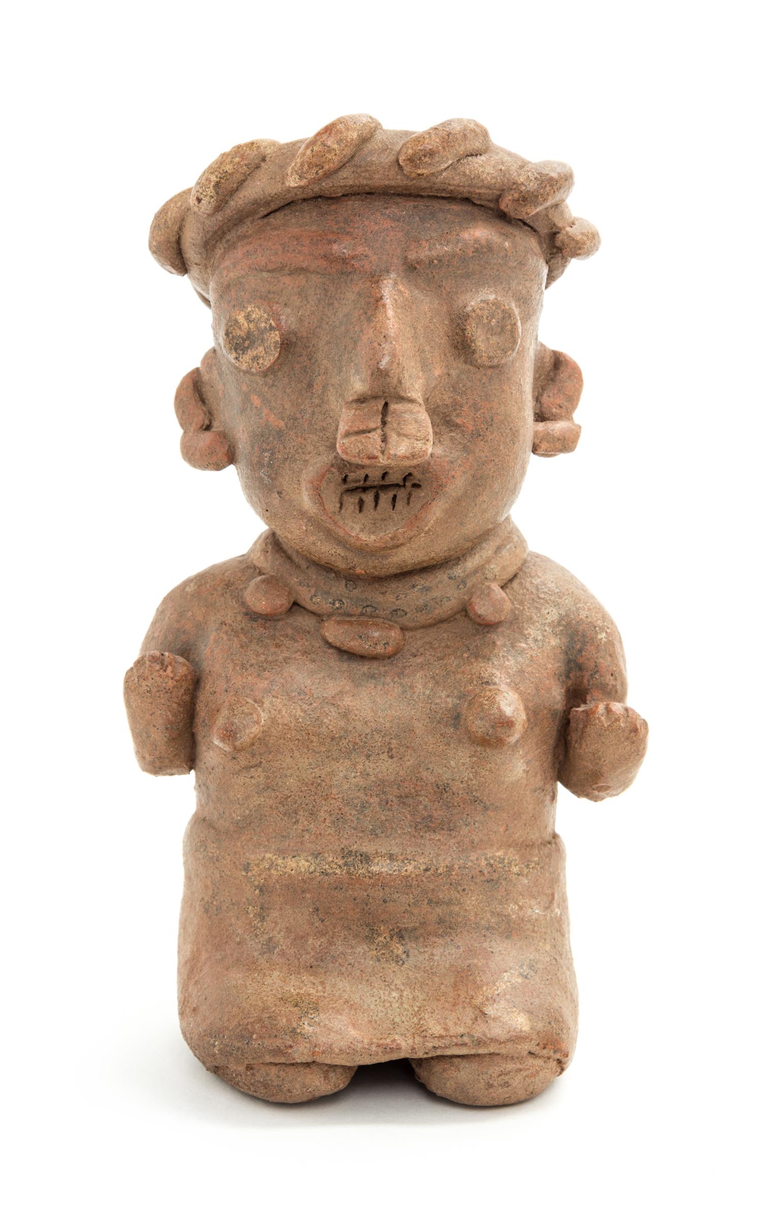 A Mexican Nayarit Polished Earthenware Figure of a Seated Female. Height 7 x width 4 x depth 3 inches.