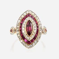A ruby, diamond, and platinum topped gold ring