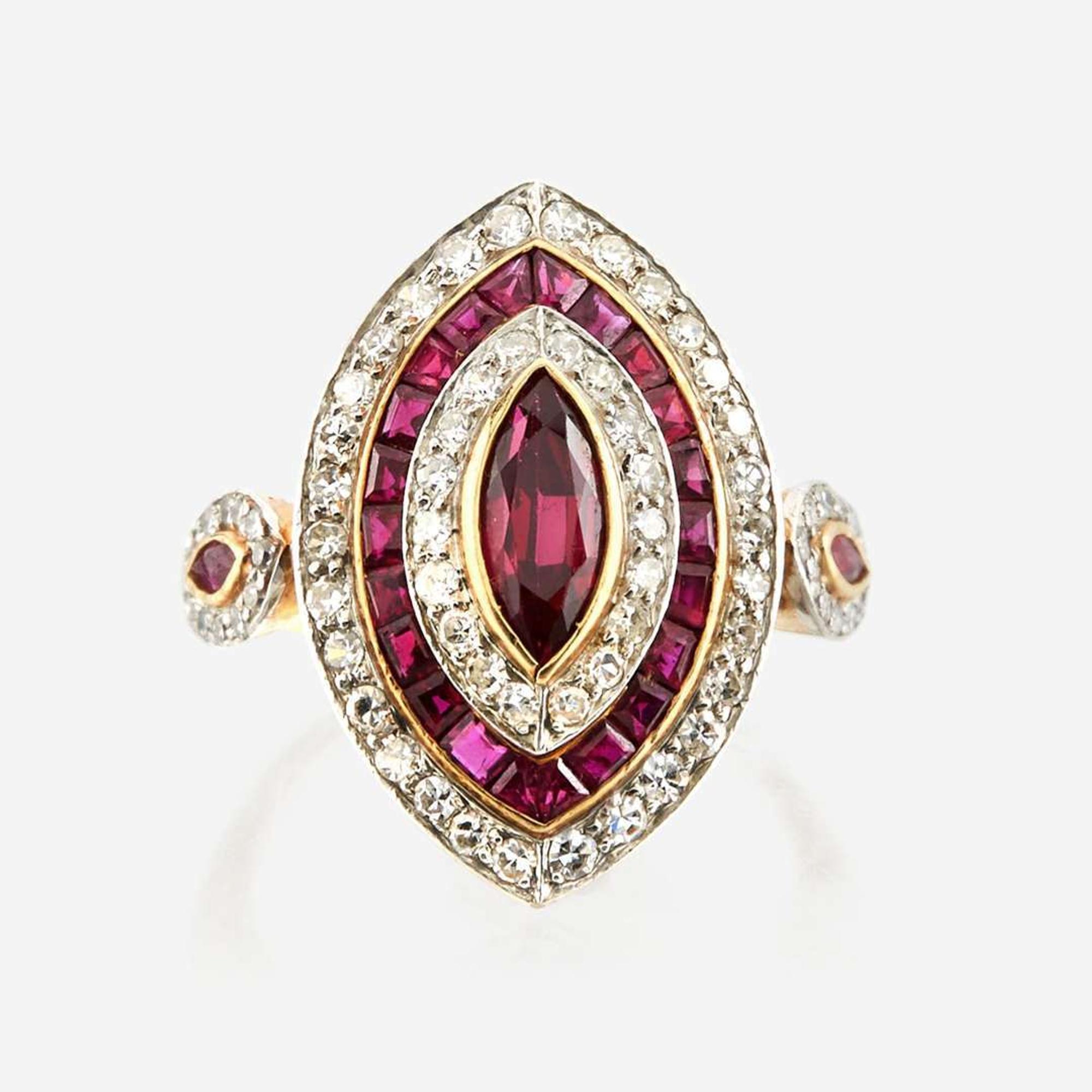 A ruby, diamond, and platinum topped gold ring