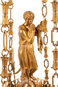 An Empire Style Gilt Bronze and Tôle Figural Chandelier