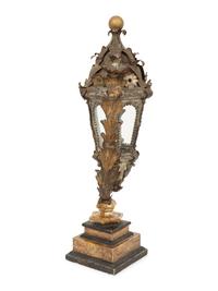 An Italian Tole Swinging Lantern on a Giltwood Stand