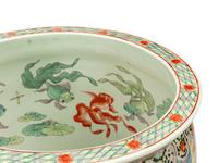 A Pair of Chinese Export Porcelain Fish Bowls with Wood Stands
