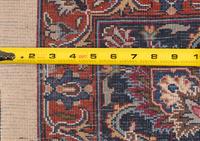 A Signed Persian Meshed Wool Rug