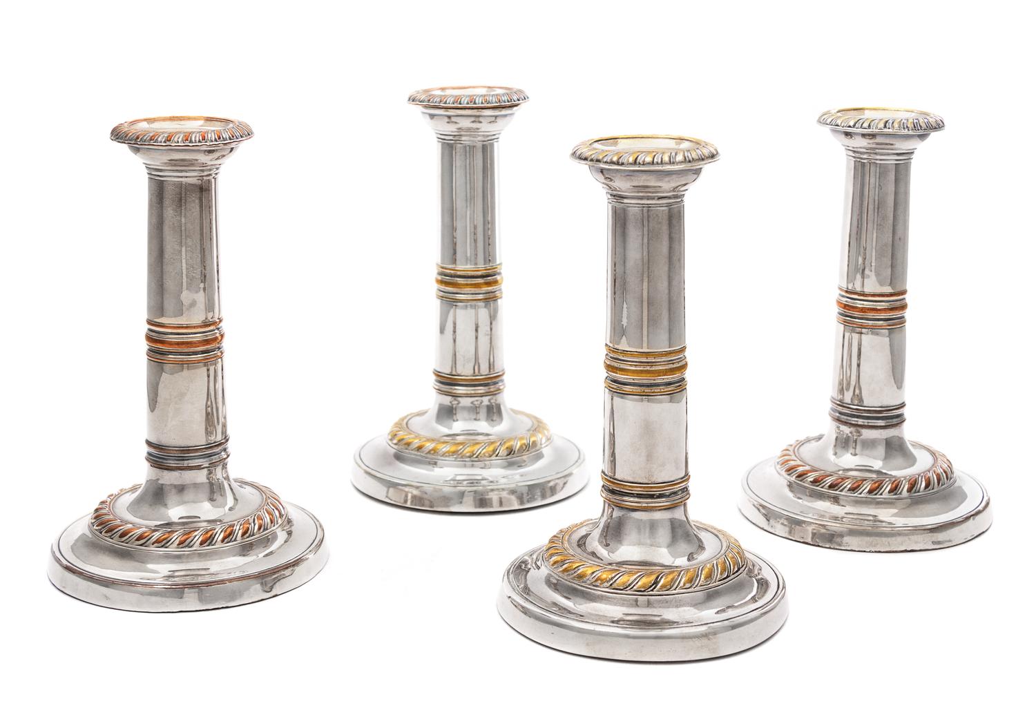 A Set of Four Regency Silver-Plate Candlesticks