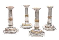 A Set of Four Regency Silver-Plate Candlesticks
