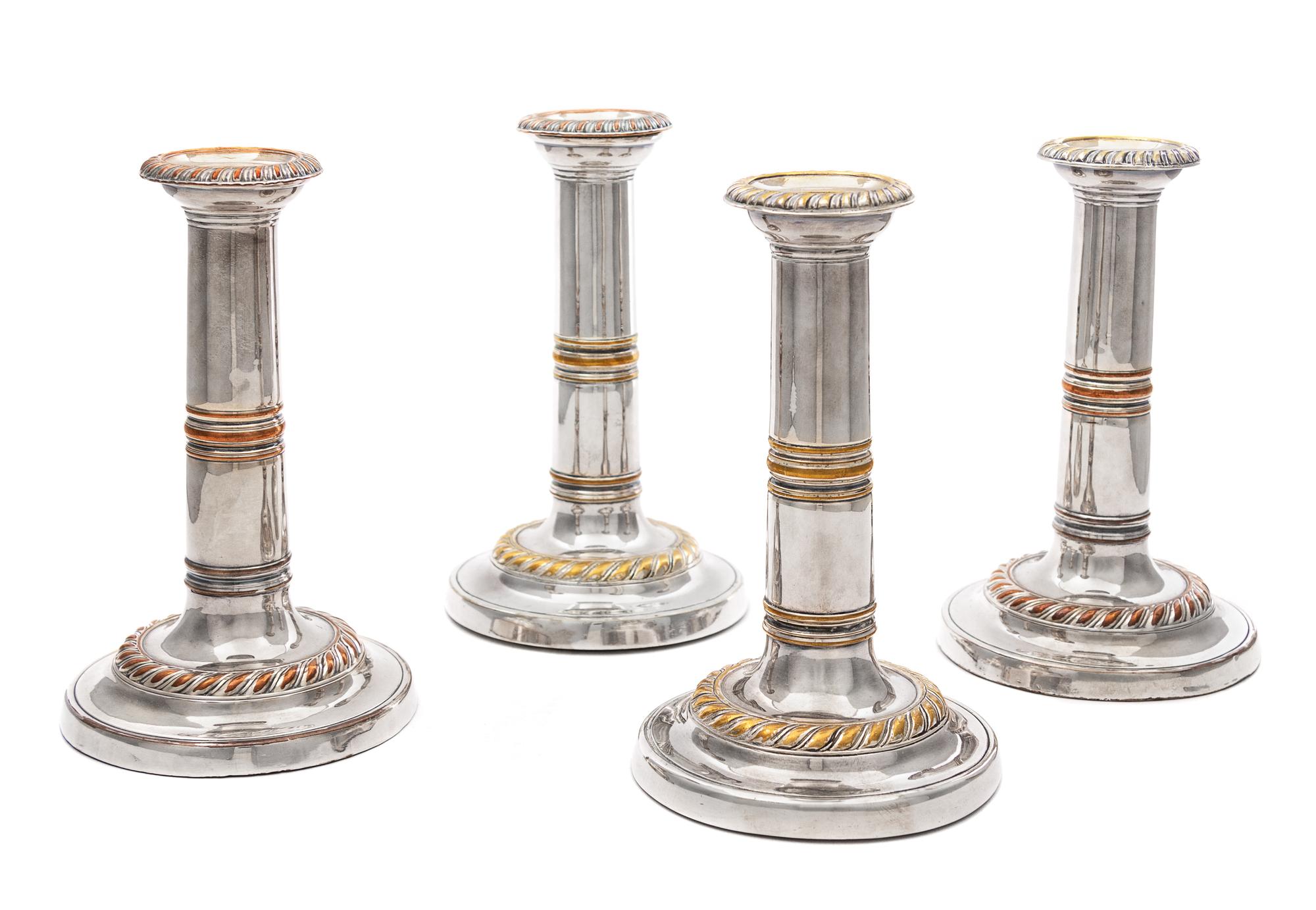 A Set of Four Regency Silver-Plate Candlesticks