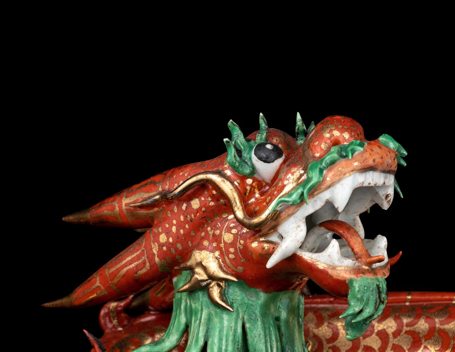 A Pair of Chinese Coral-Ground Gilt and Green Enameled Porcelain Dragons