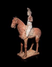 A Pair of Chinese Pottery Equestrian Figures