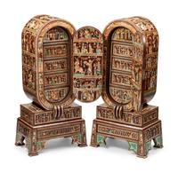 A Pair of Egyptian Style Painted and Inlaid Cabinets