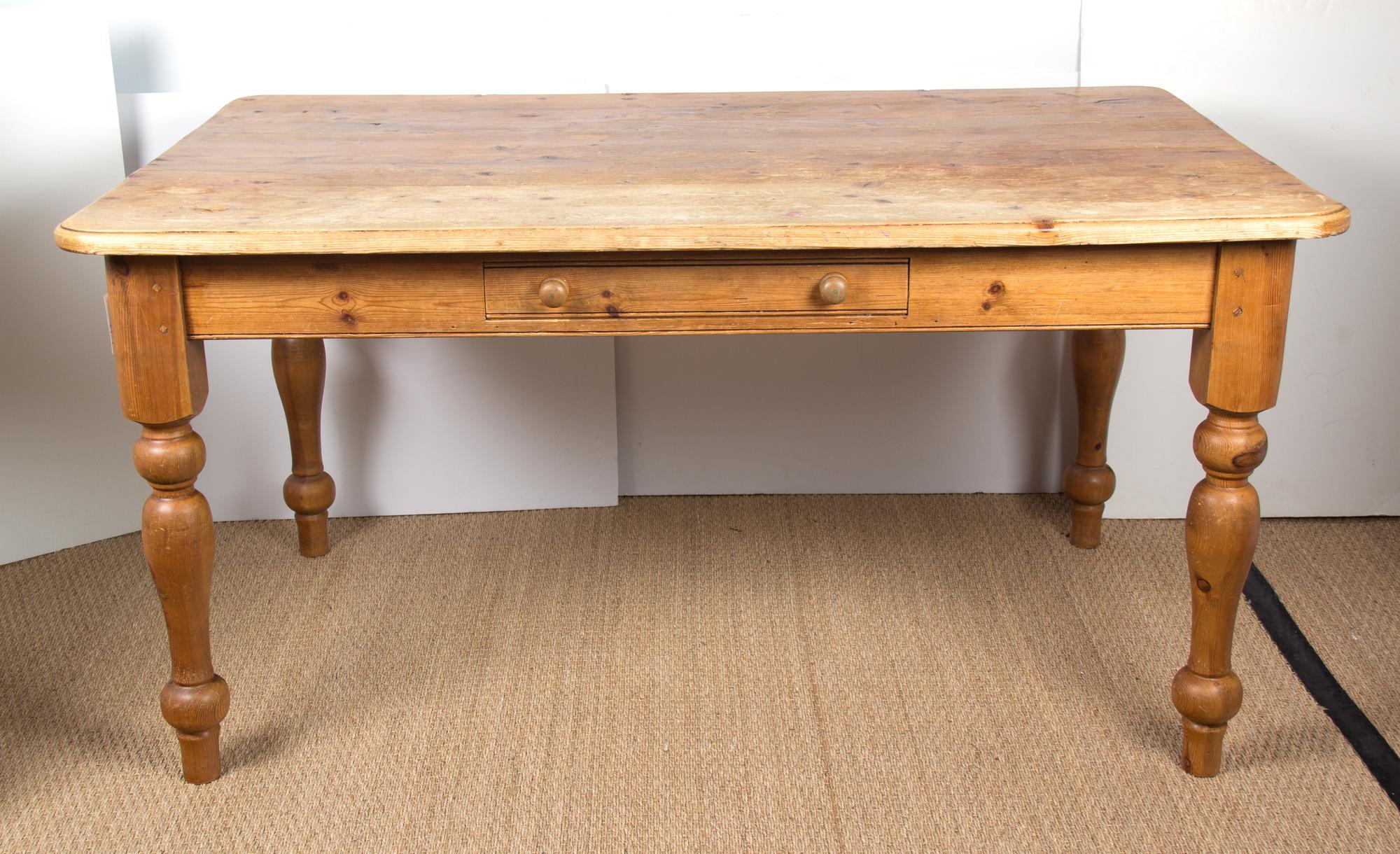 An American Pine Kitchen Table Height 30 x length 59 x width 37 1/2 inches. — 20TH CENTURY