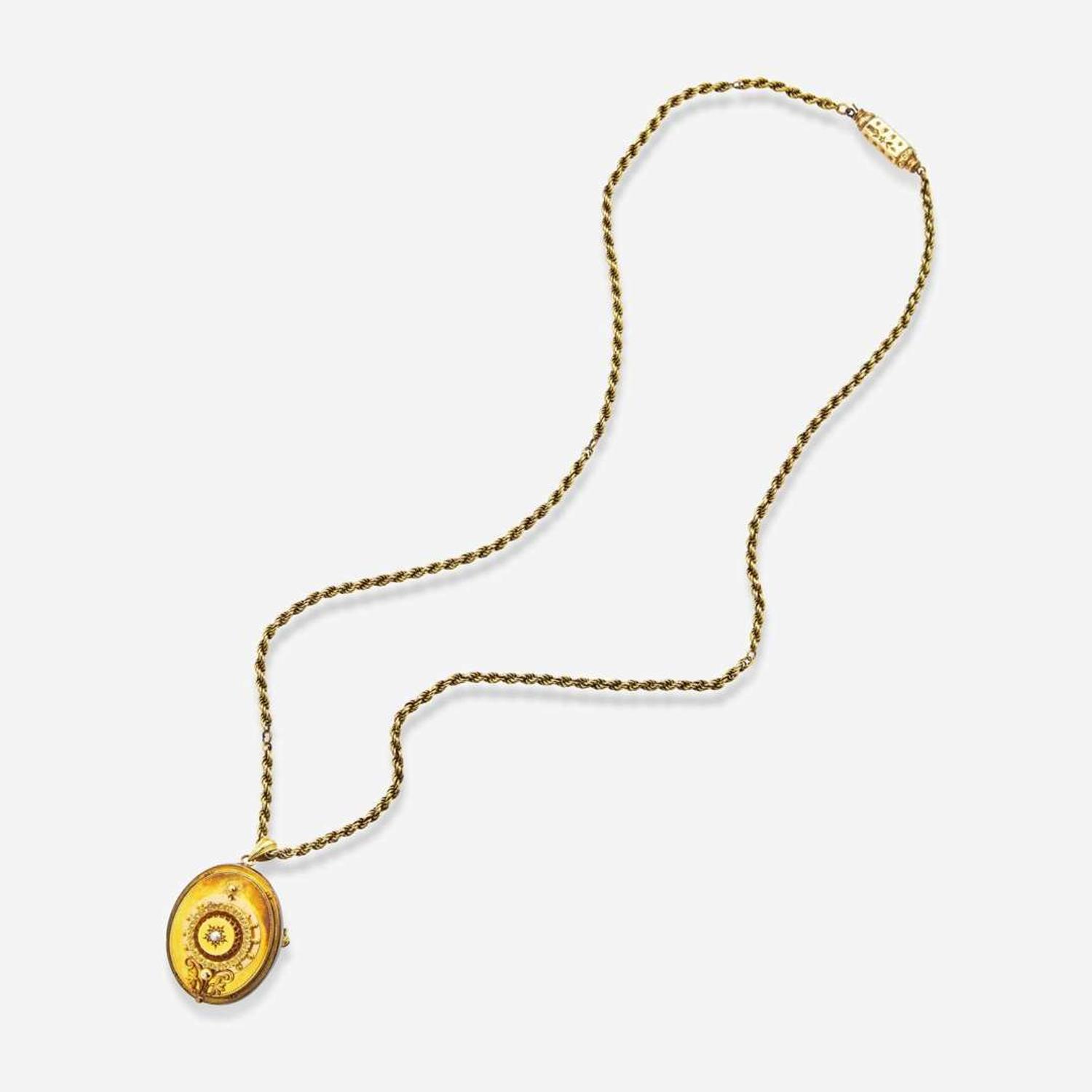 A 14K Yellow Gold Victorian Pendant and Chain