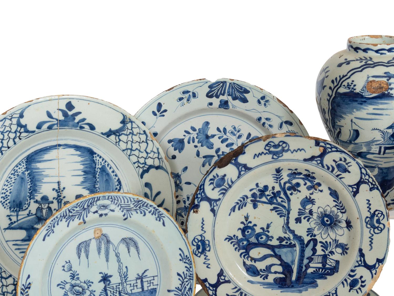 A Group of Thirteen Delft Earthenware Plates and Chargers