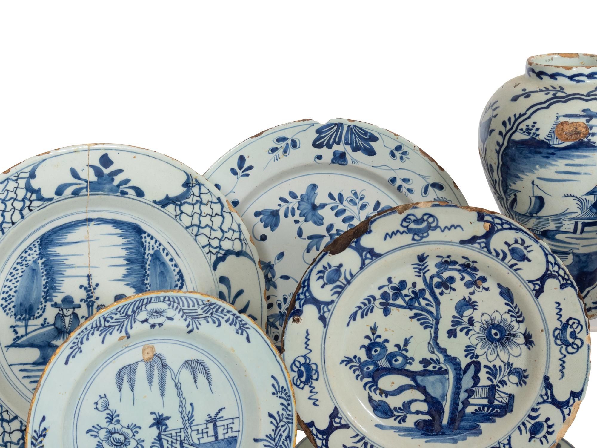 A Group of Thirteen Delft Earthenware Plates and Chargers