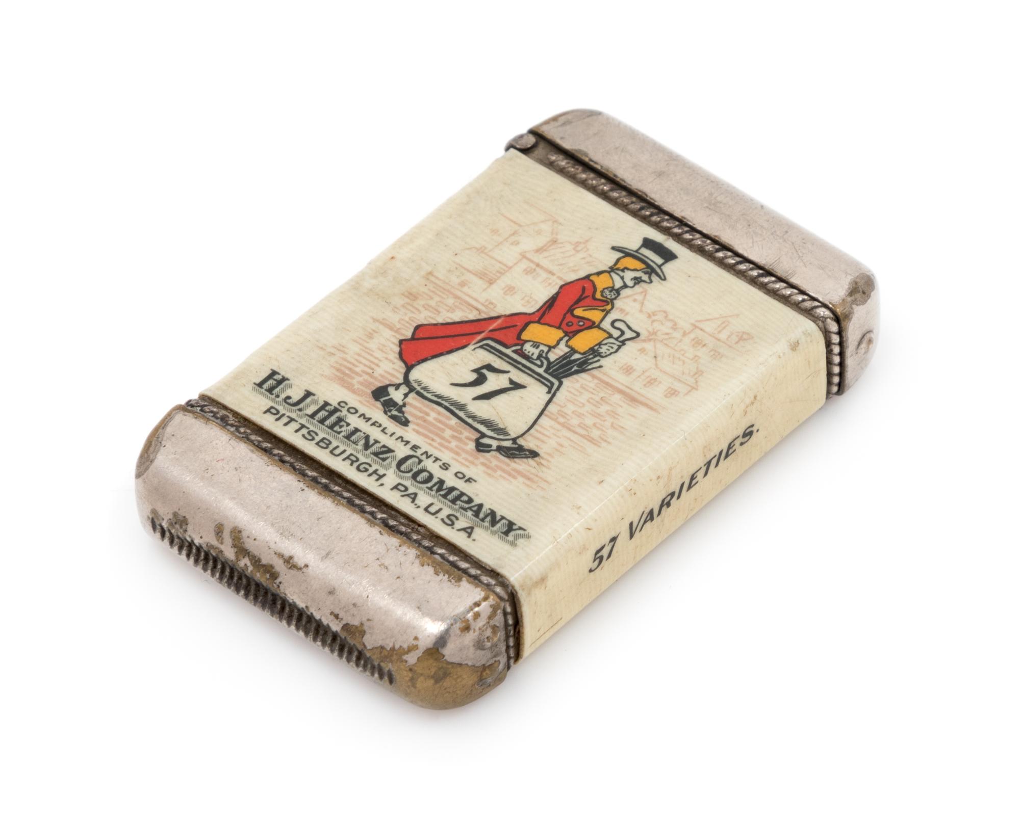 An H.J. Heinz Company Celluloid and Mixed Metal Advertisement Match Safe Height 2 3/8 inches. — CIRCA 1903