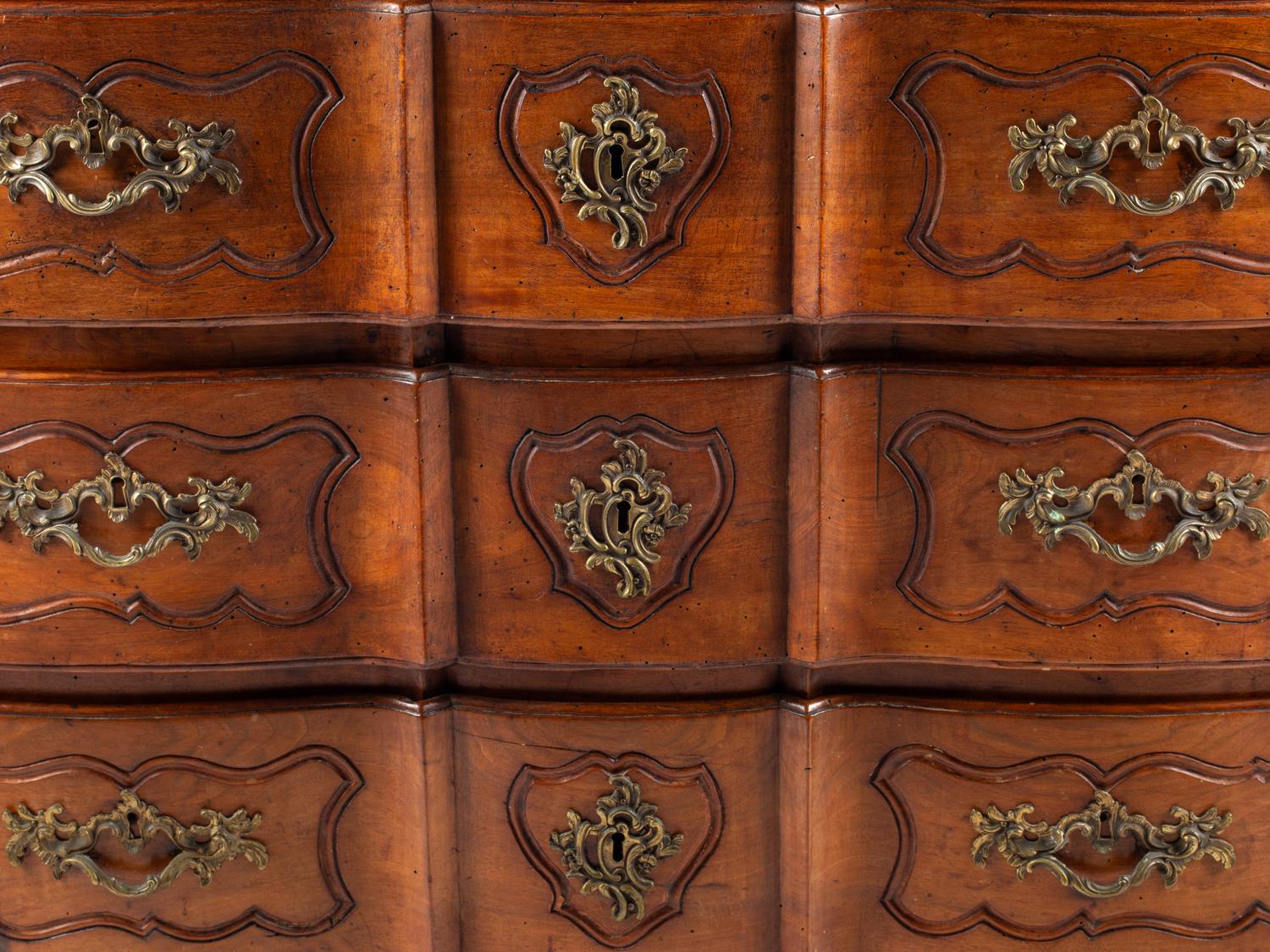 A Louis XV Provincial Walnut Commode