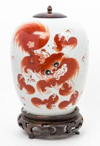 An Iron Red Decorated Porcelain Jar and Cover Height 15 inches overall.