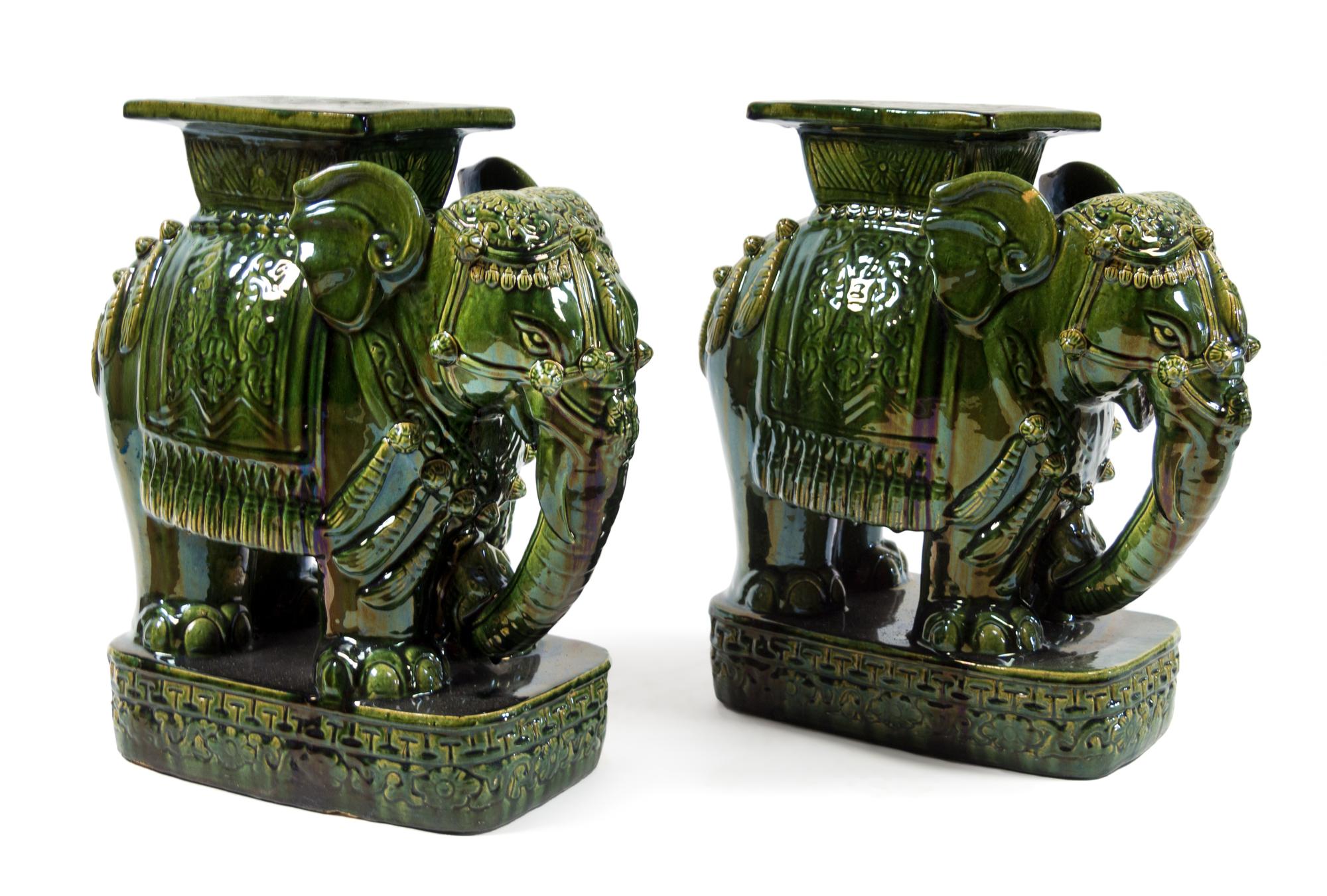 A Pair of Glazed Terracotta Elephant Garden Stools Height 23 inches. — 20TH CENTURY