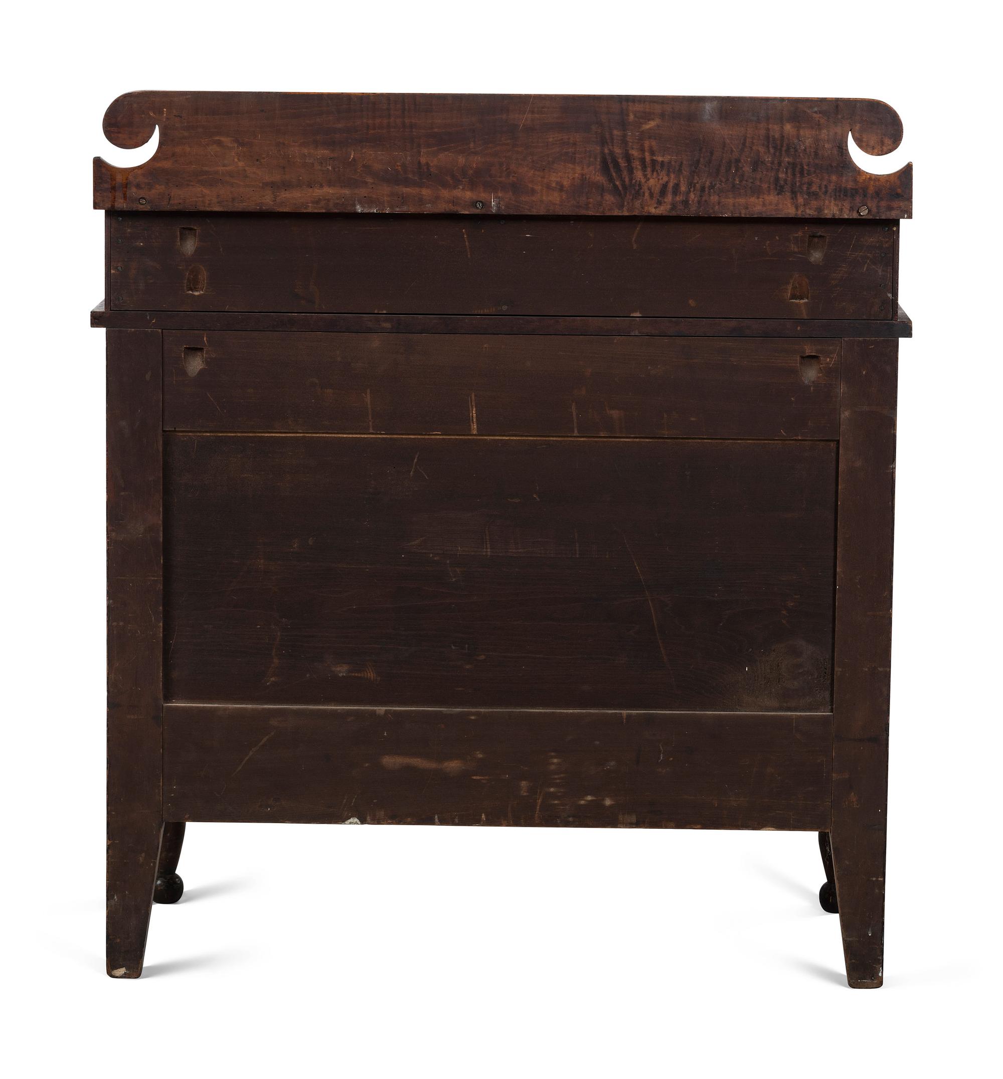 A Classical Tiger Maple and Cherrywood Chest of Drawers