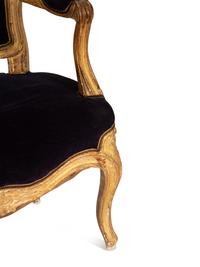 A Pair of Louis XV Giltwood Fauteuils