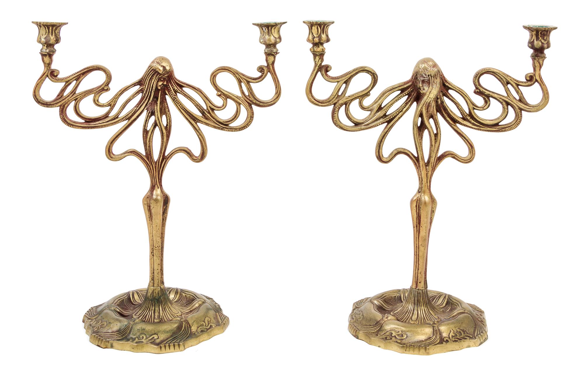 A Pair of Art Nouveau Cast Metal Two-Light Candelabra Height 17 inches.