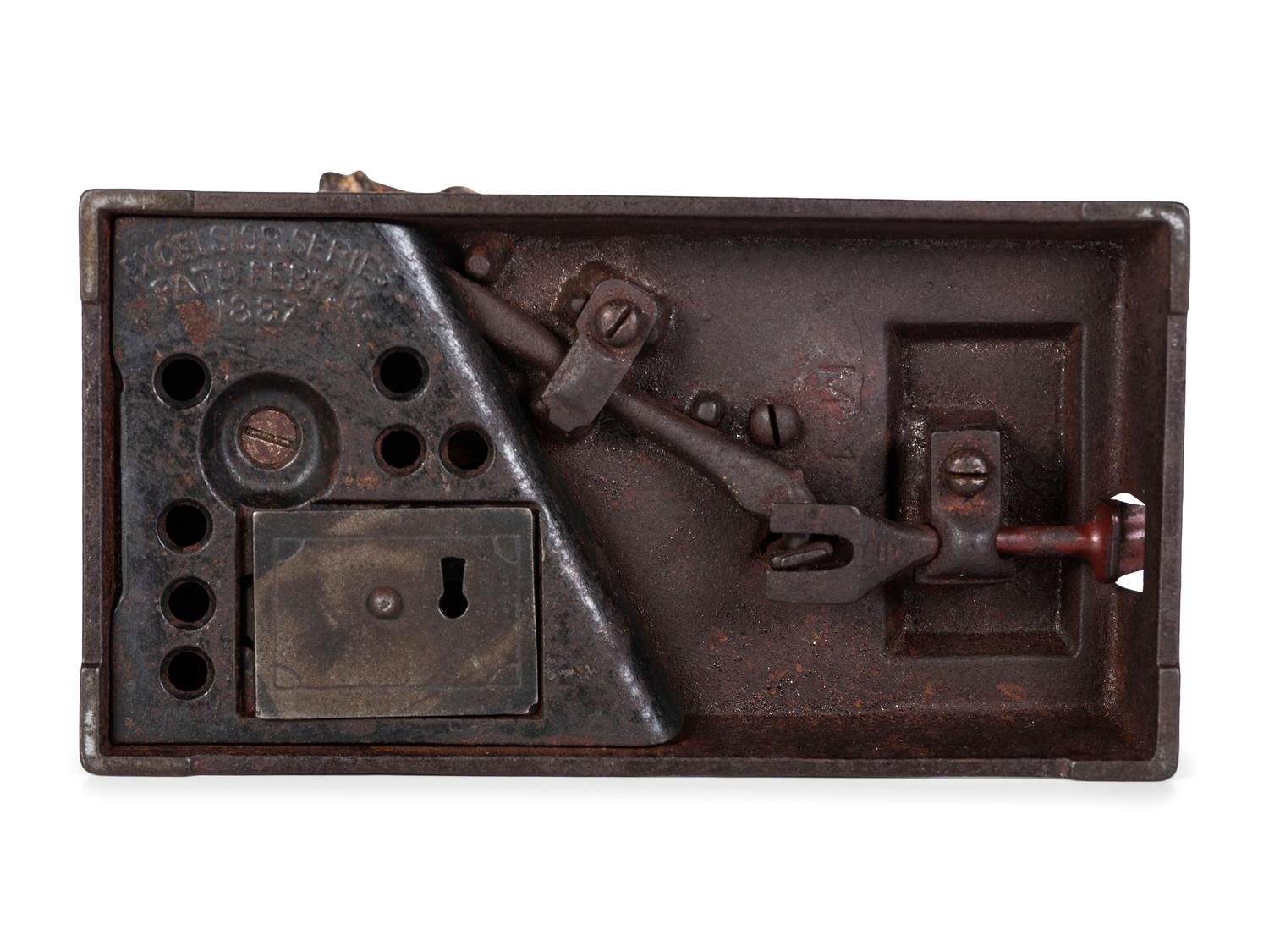 A Shephard Hardware Excelsior Series 'Mason' Cast Iron Mechanical Bank