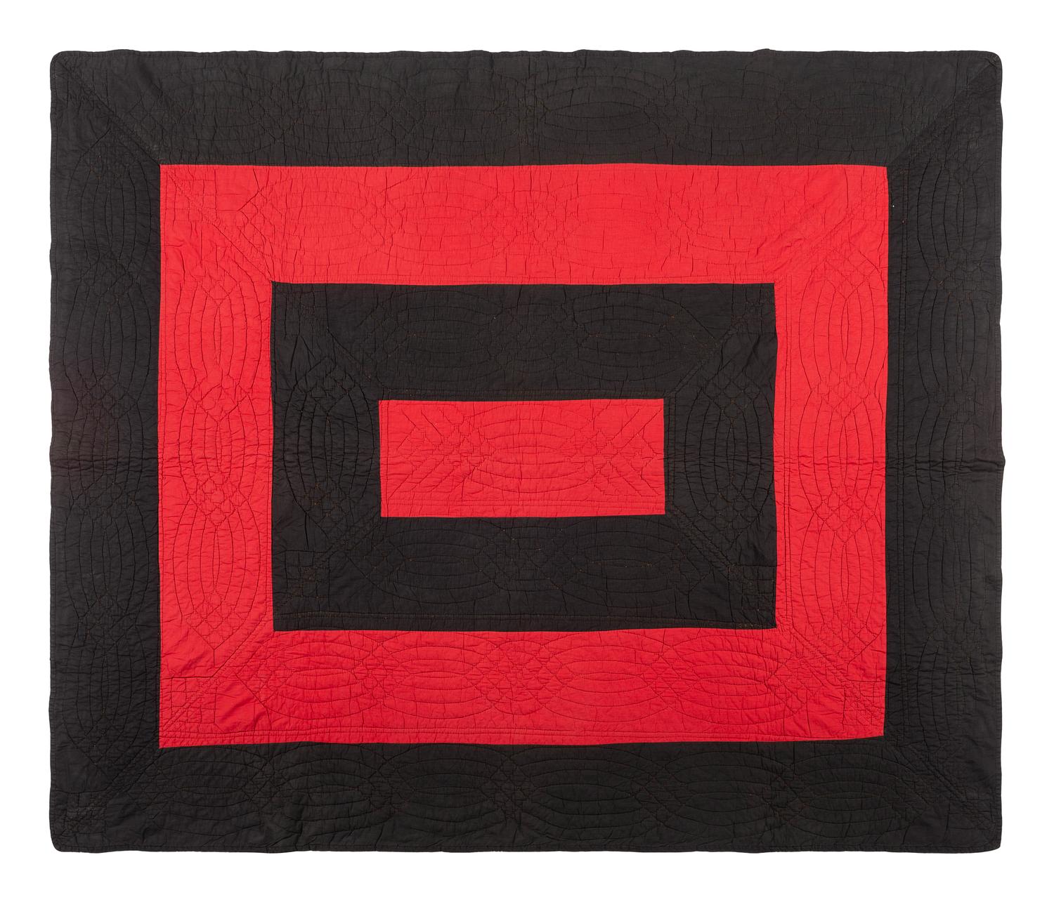 An Amish Red and Black Pieced Cotton Quilt
