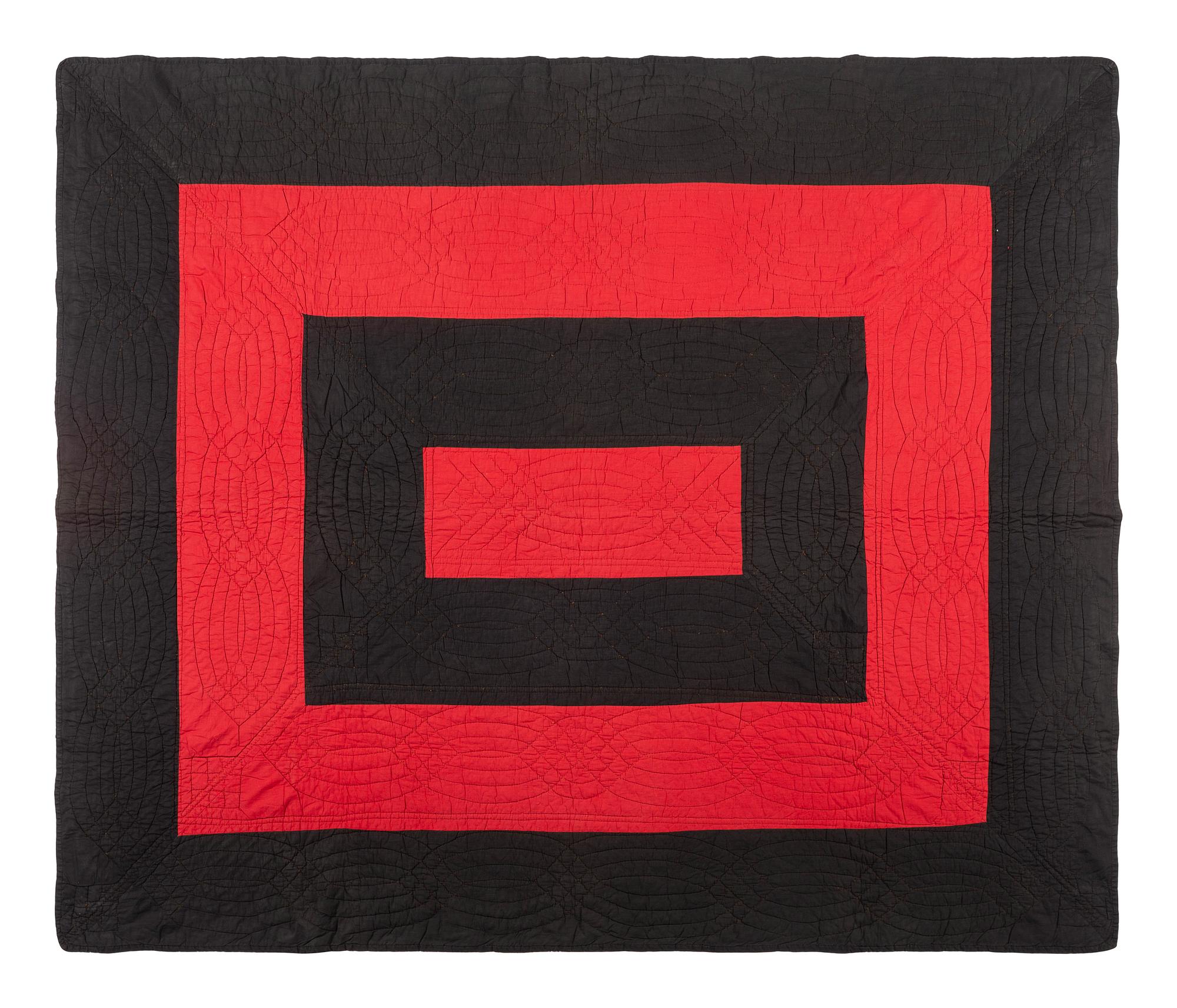 An Amish Red and Black Pieced Cotton Quilt