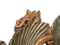 A Pair of Continental Gilt and Silvered Wood “Grotto” Settees