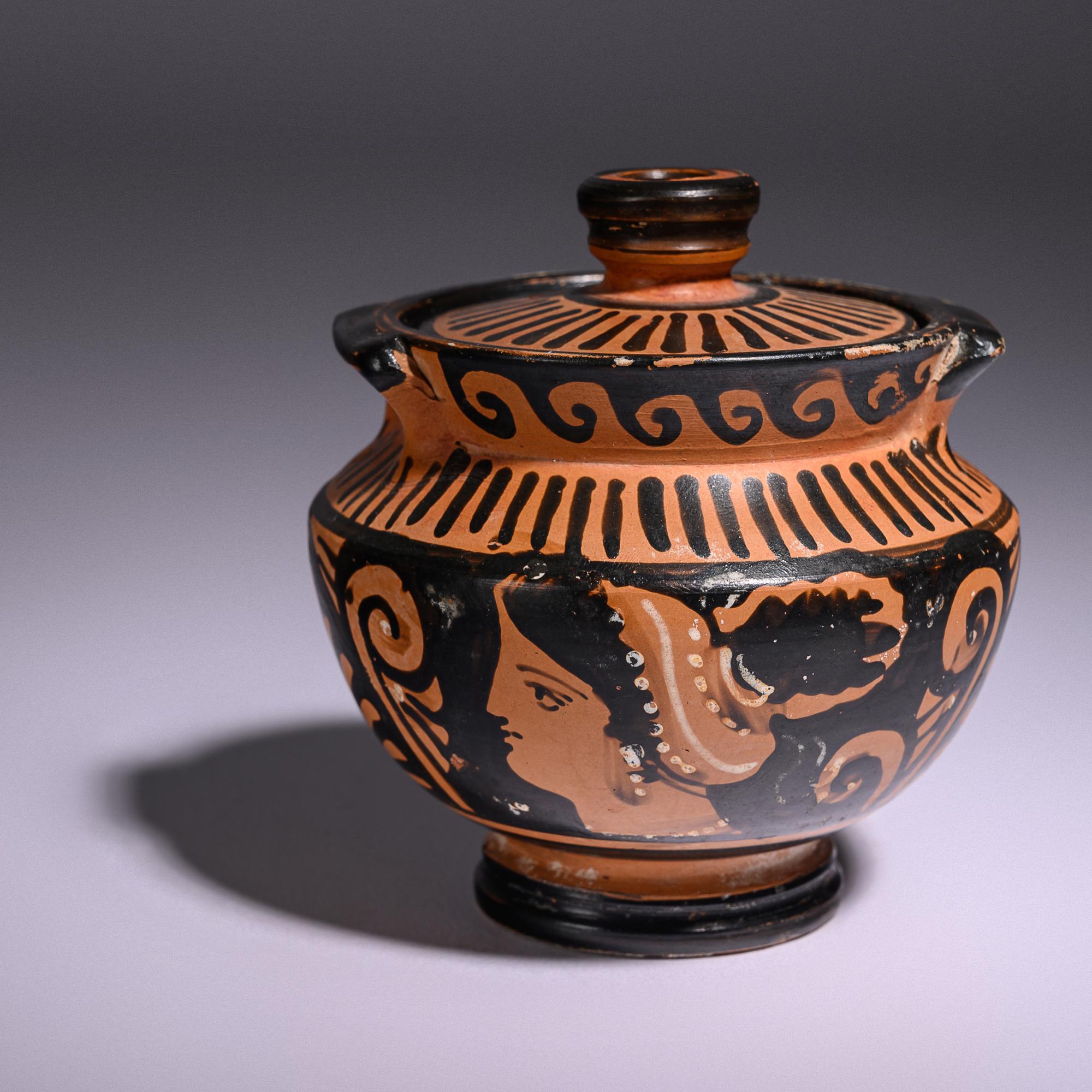 An Apulian Red-Figured Lidded Pyxis