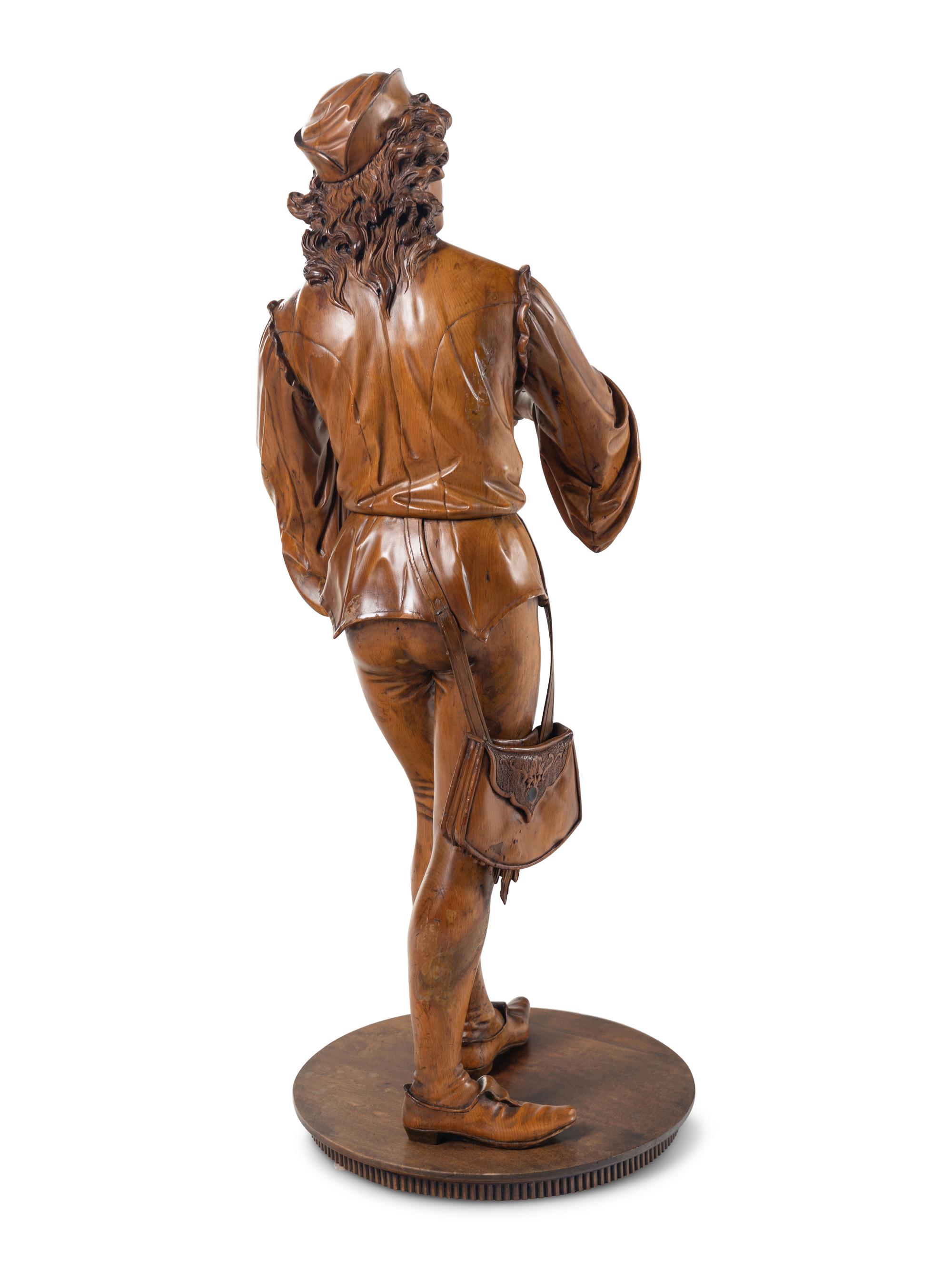 A Venetian Carved Wood Figure of a Musician in the Manner of Valentino Besarel