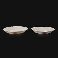 An associated pair of Chinese whiteware floriform dishes Song dynasty