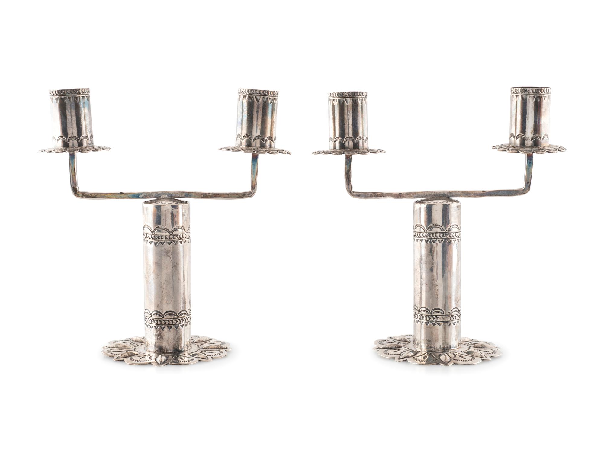 Pair of Heavily Stamped Silver Candelabras