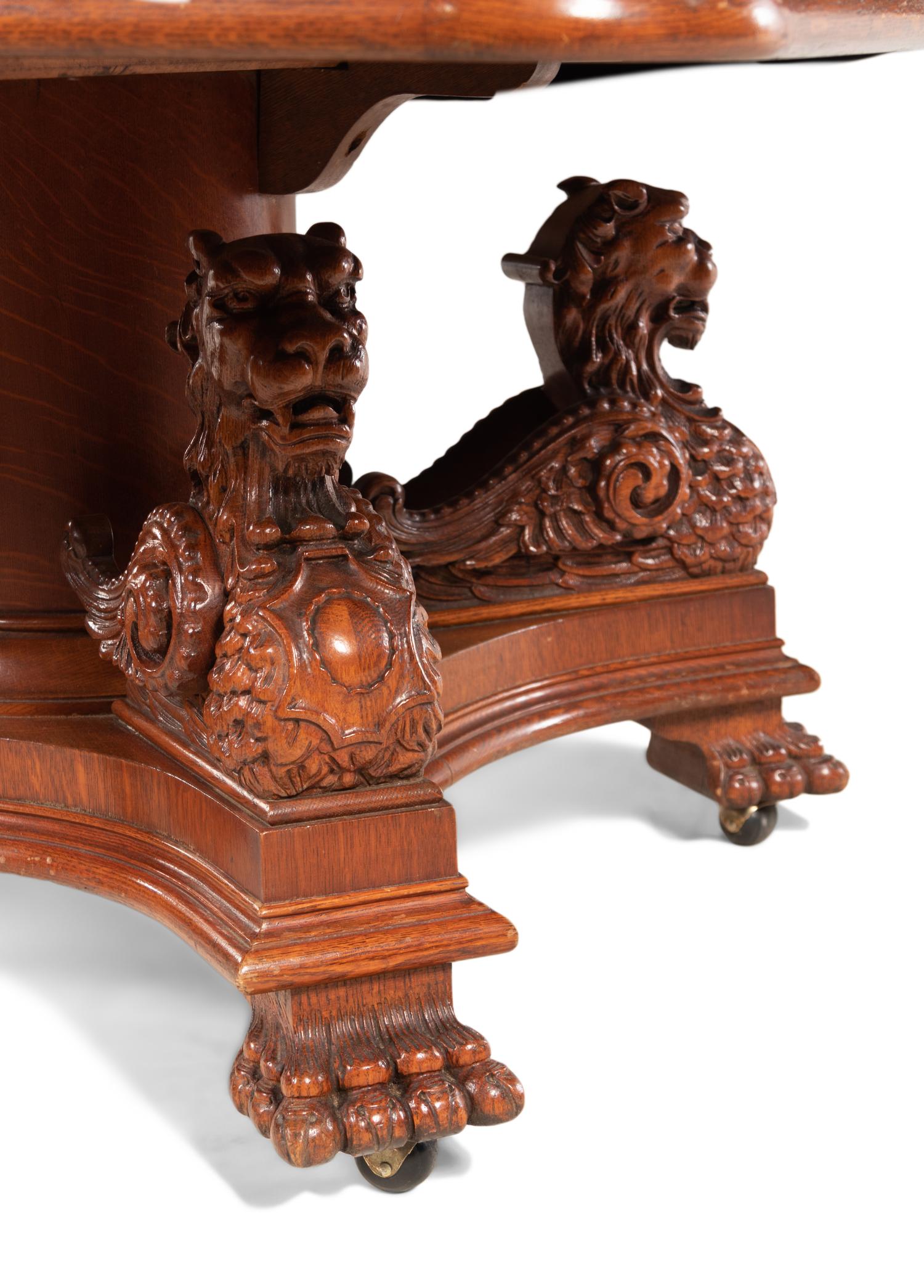 An American Renaissance Revival Carved Oak Extension Dining Table