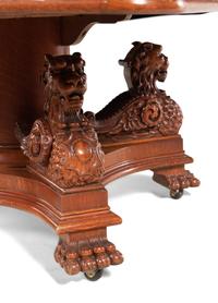 An American Renaissance Revival Carved Oak Extension Dining Table