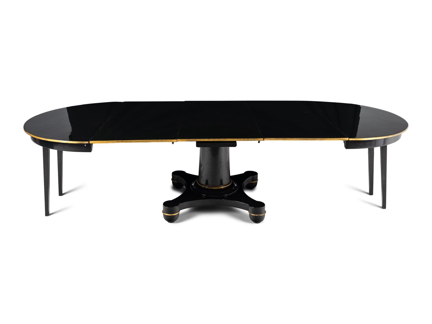 A Biedermeier Black Painted and Parcel-Gilt Pedestal Dining Table