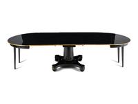 A Biedermeier Black Painted and Parcel-Gilt Pedestal Dining Table