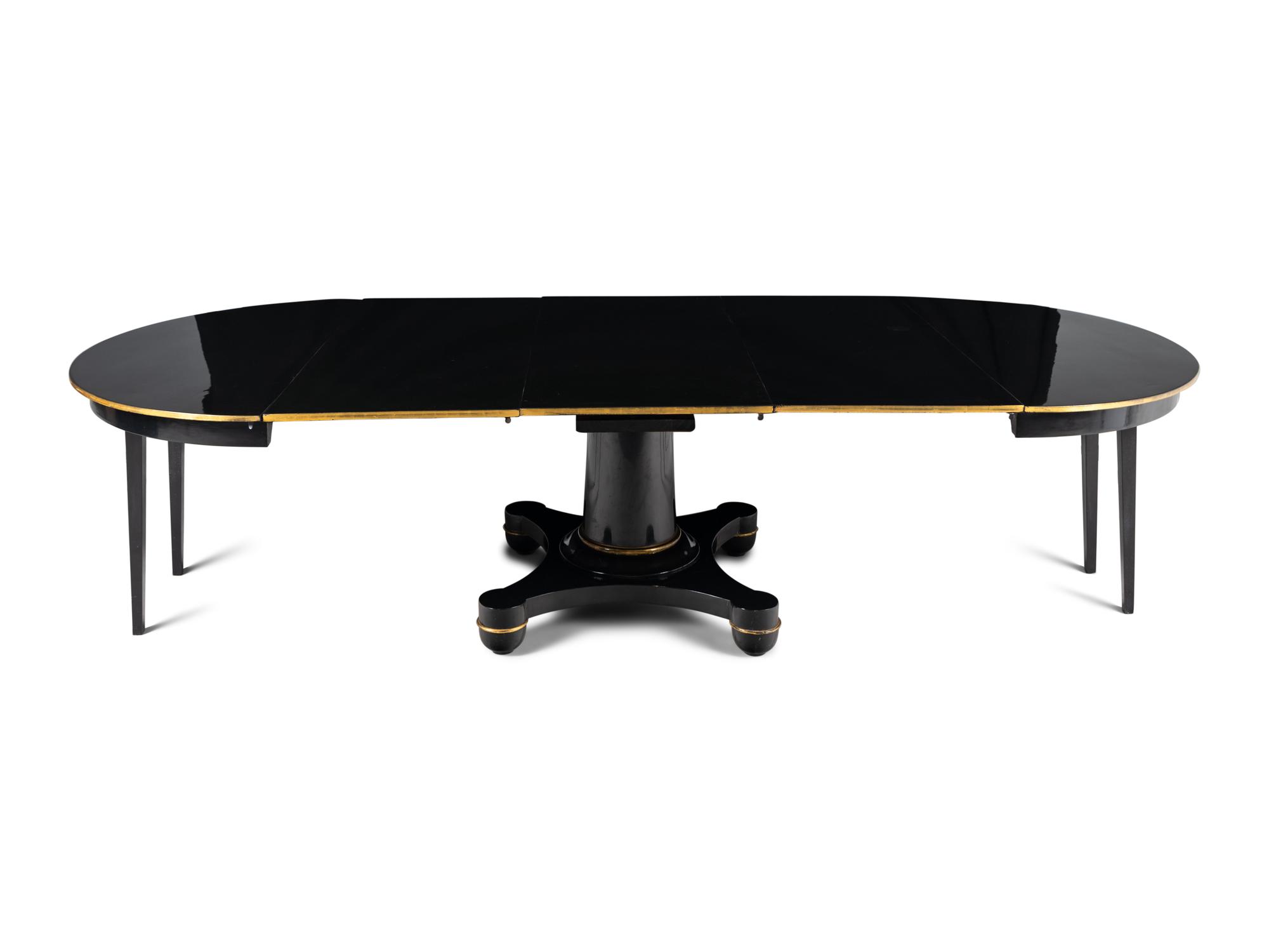 A Biedermeier Black Painted and Parcel-Gilt Pedestal Dining Table
