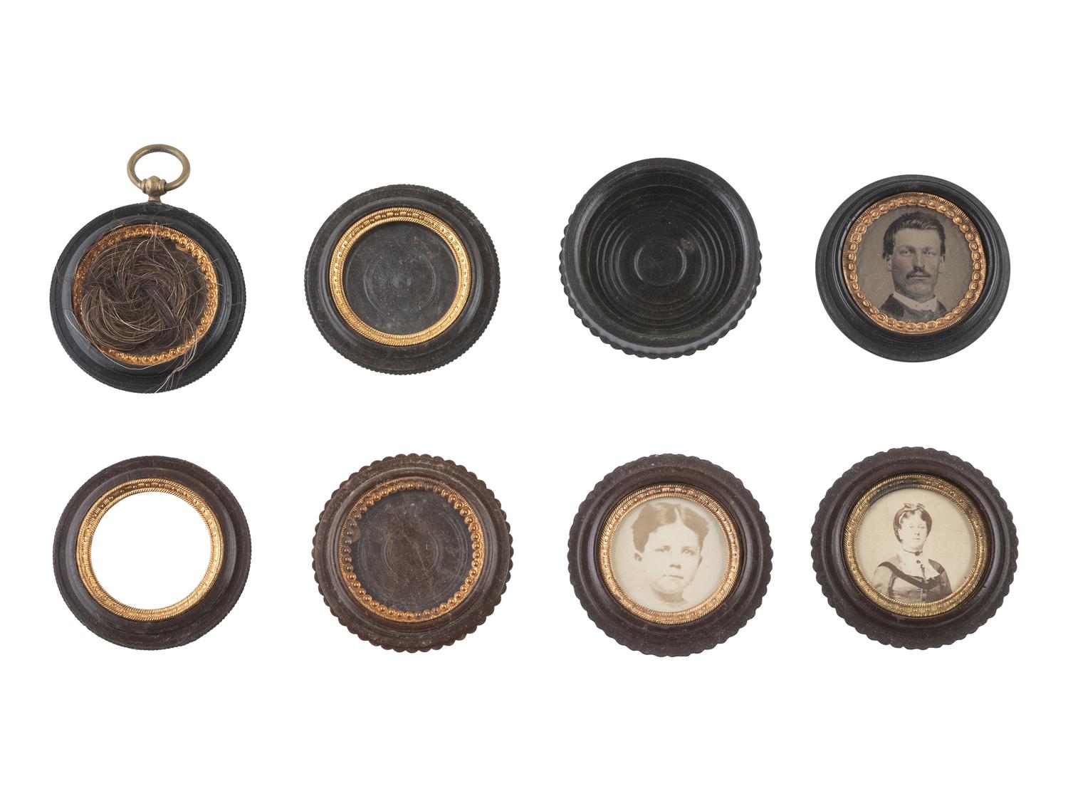 [EARLY PHOTOGRAPHY]. 8 black and brown "oreo" cases.