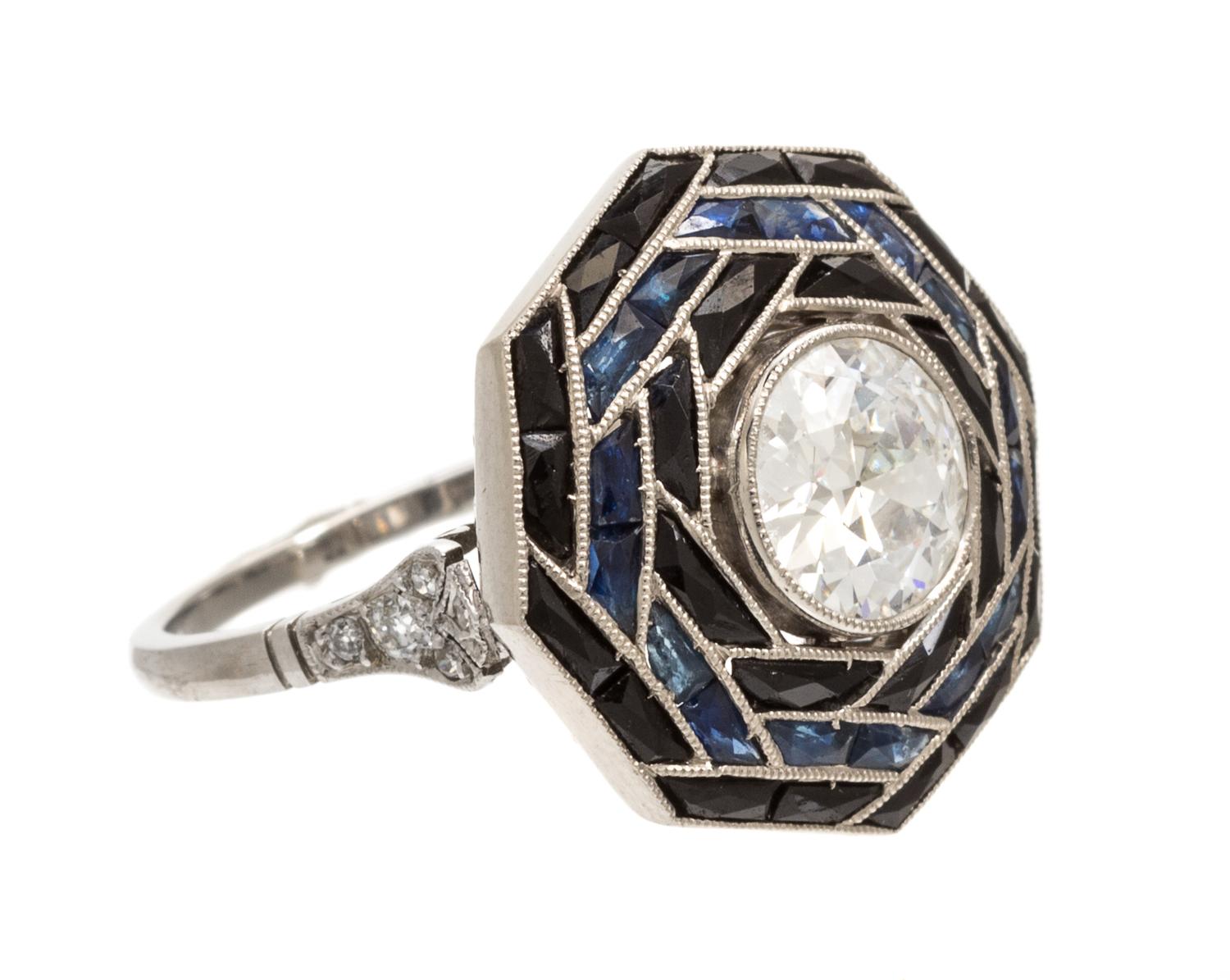 A Platinum, Diamond and Sapphire Ring, 3.90 dwts.