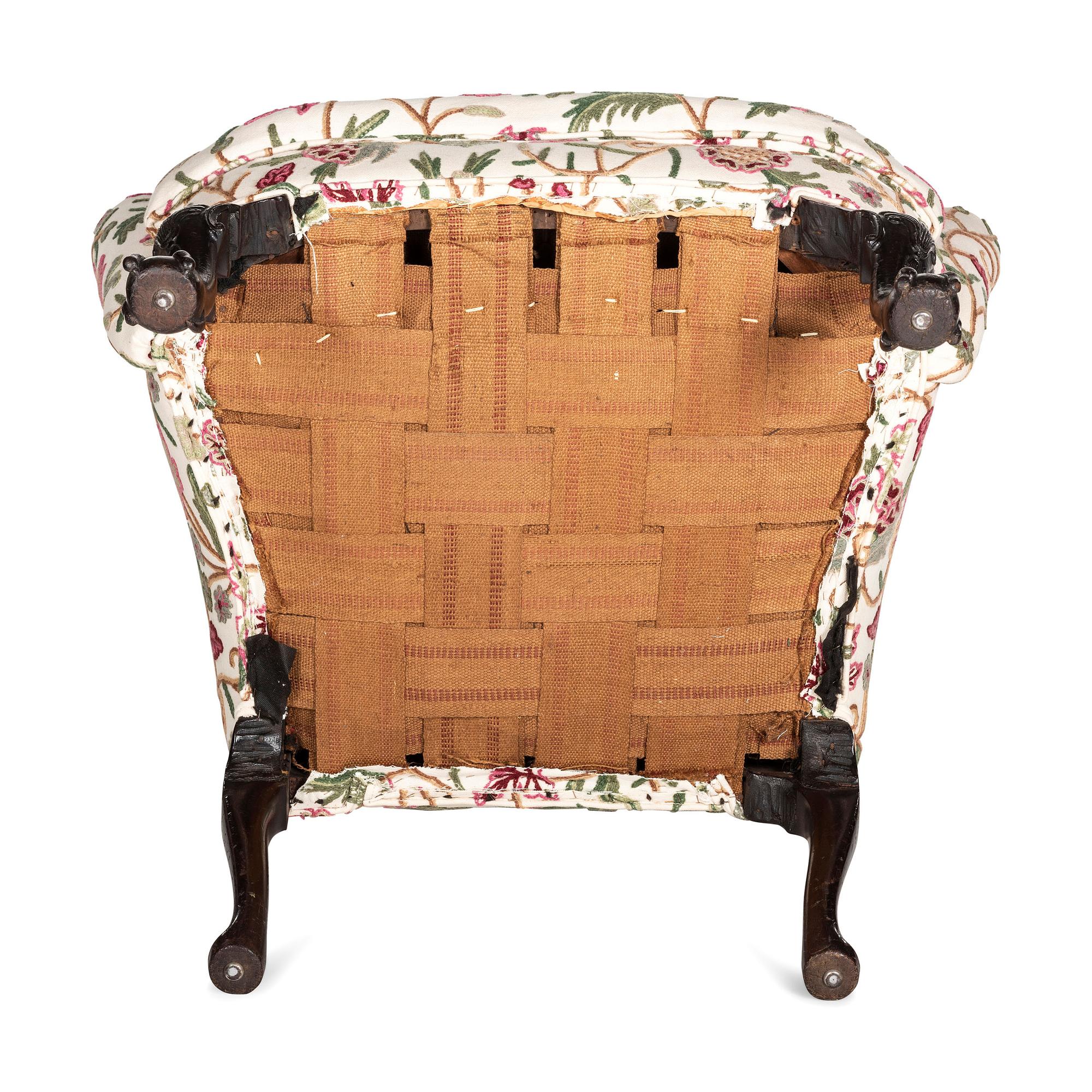 A George III Shell Carved Mahogany Claw and Ball Foot Easy Chair