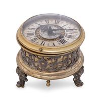 A German Gilt Metal and Silvered Brass Table Clock