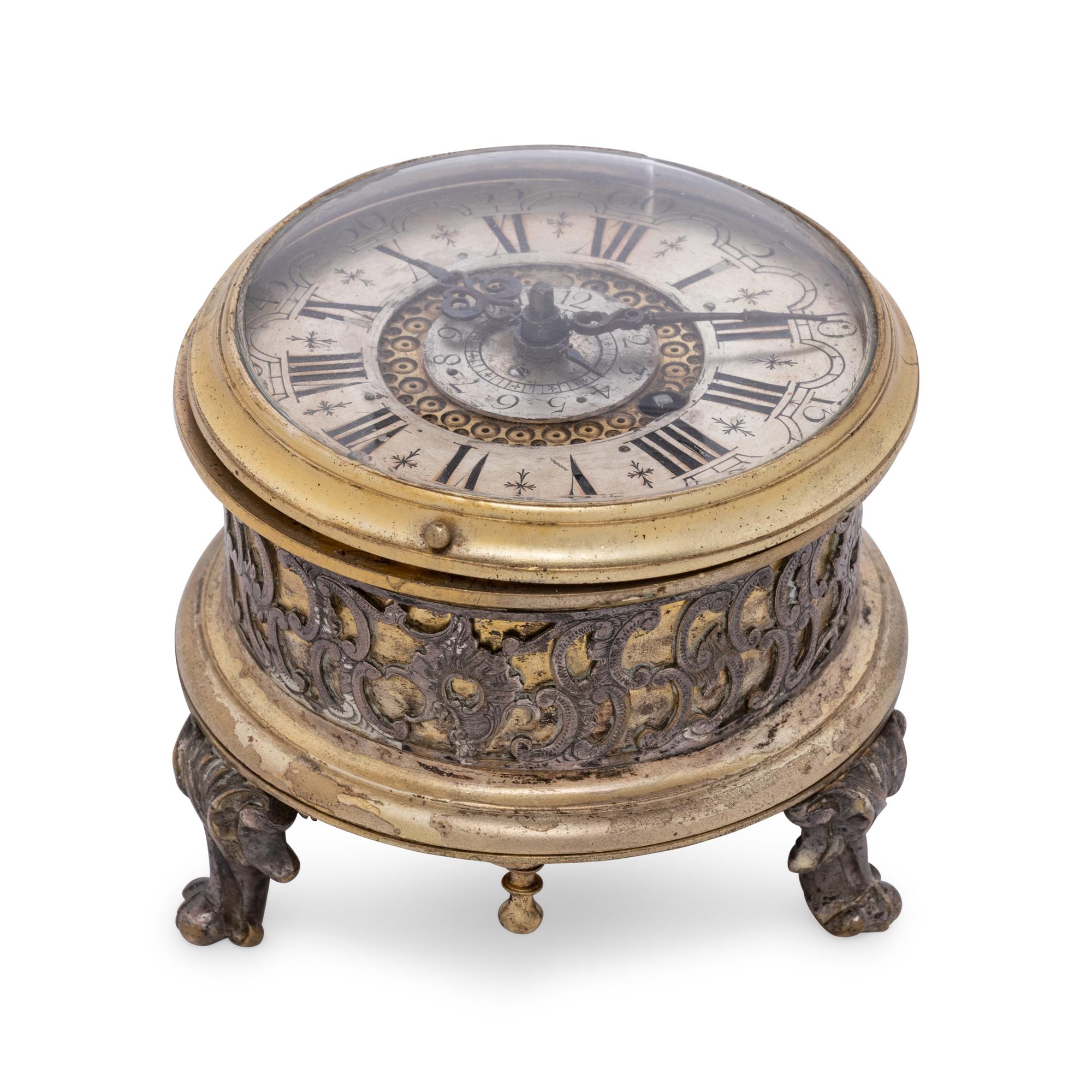 A German Gilt Metal and Silvered Brass Table Clock