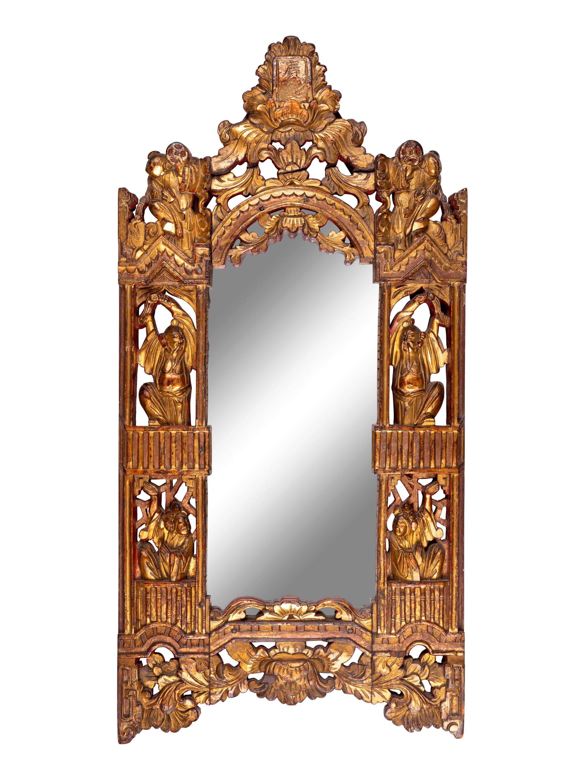 A Chinese Red and Gilt Lacquered Carved Wood Mirror