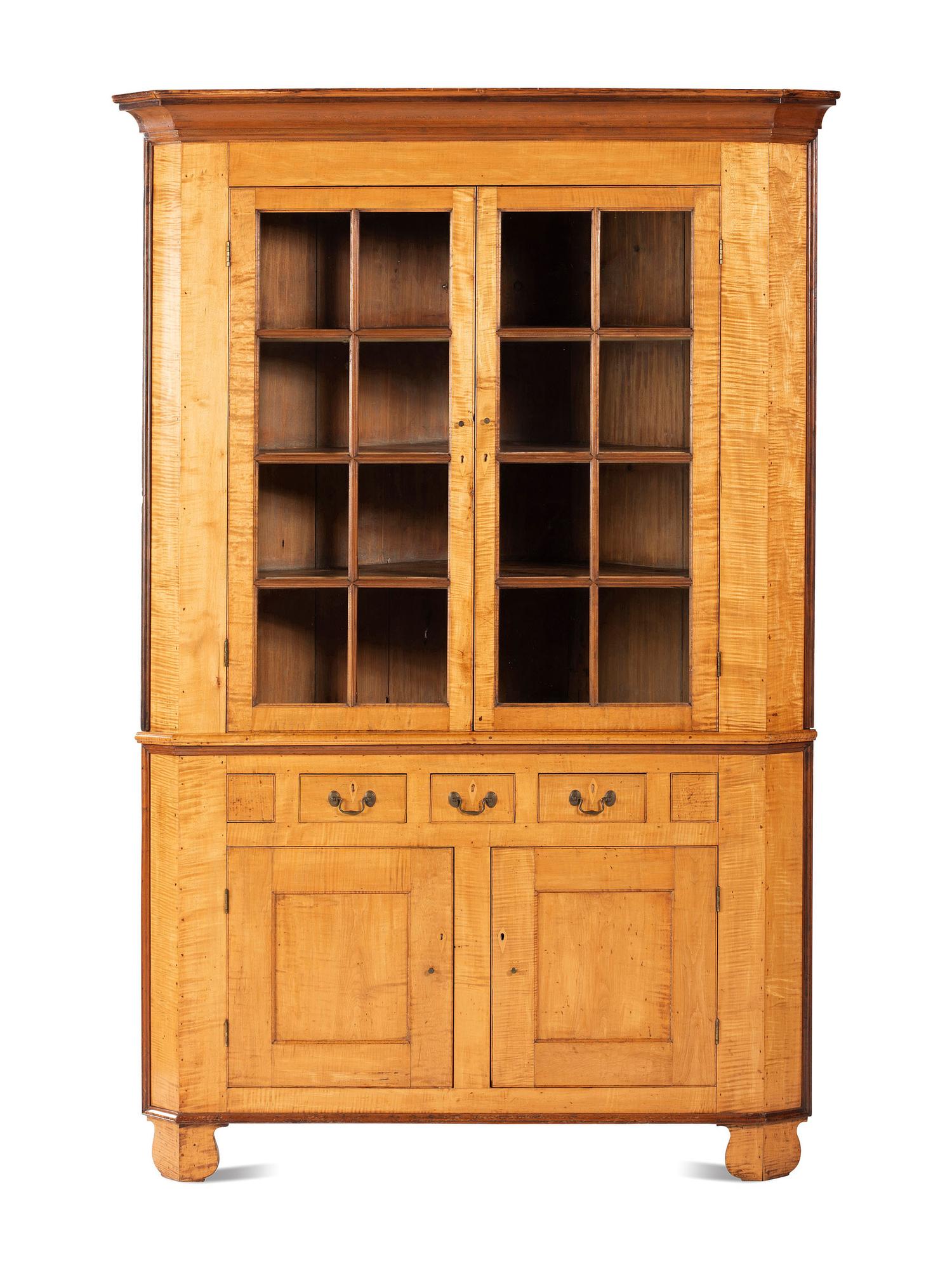 A Federal Style Tiger Maple Corner Cupboard