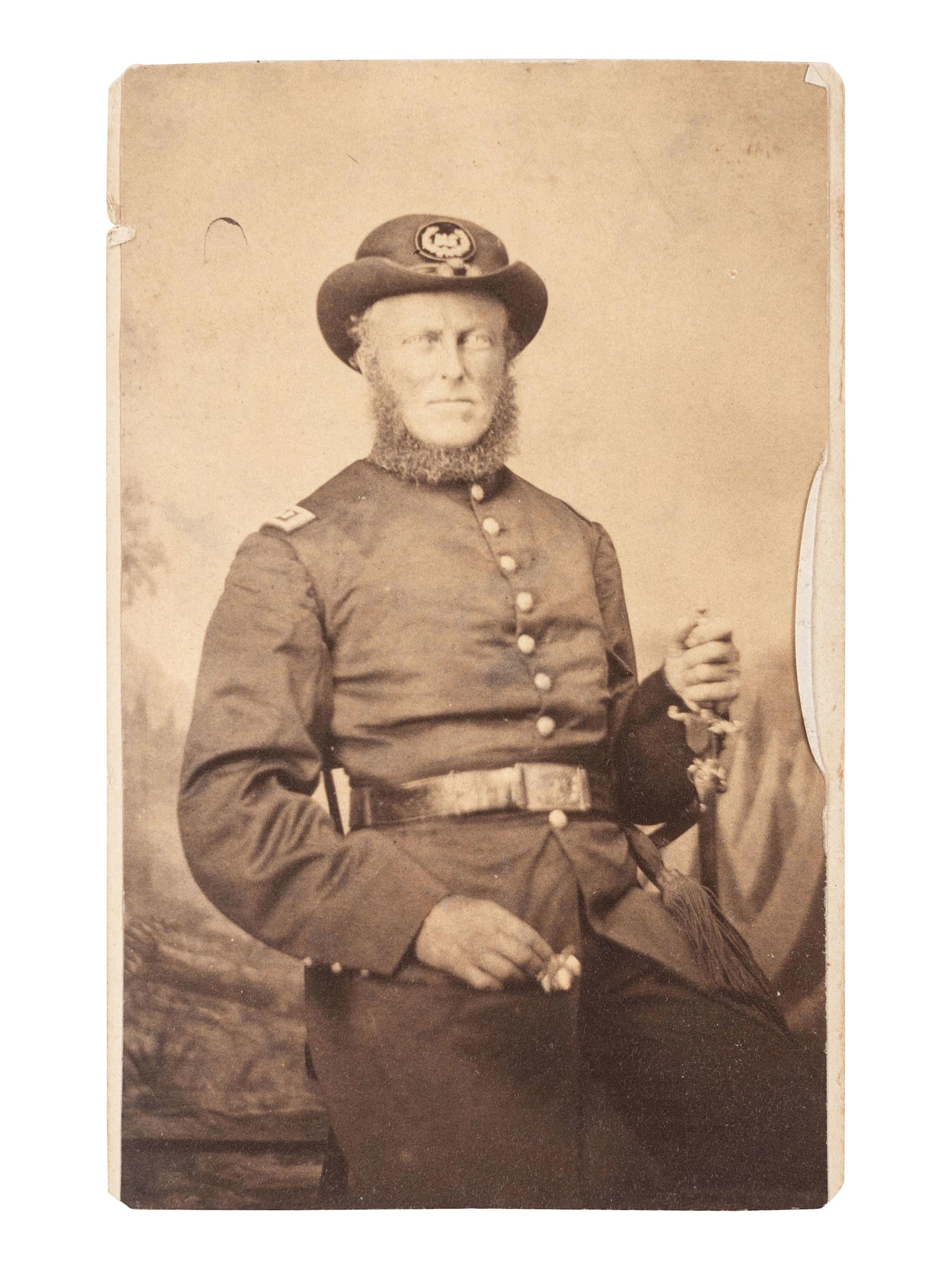 [CIVIL WAR]. CDV album containing images of 2 soldiers, incl. Corodon Mason, USCT, 32nd Infantry.