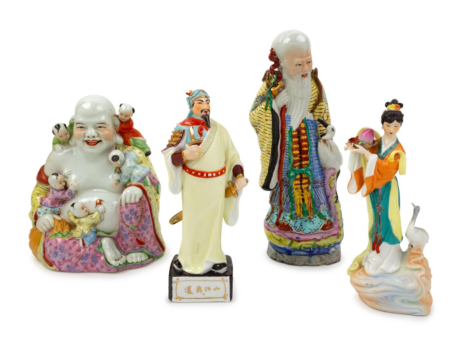 Four Chinese Famille Rose Porcelain Figures