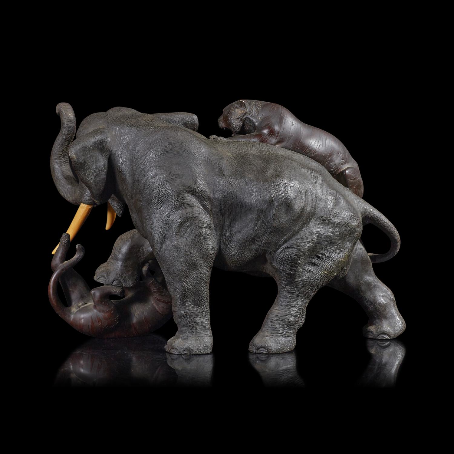 A Japanese Bronze Figural Group of Elephant and Tigers, Late Meiji to Taisho Period