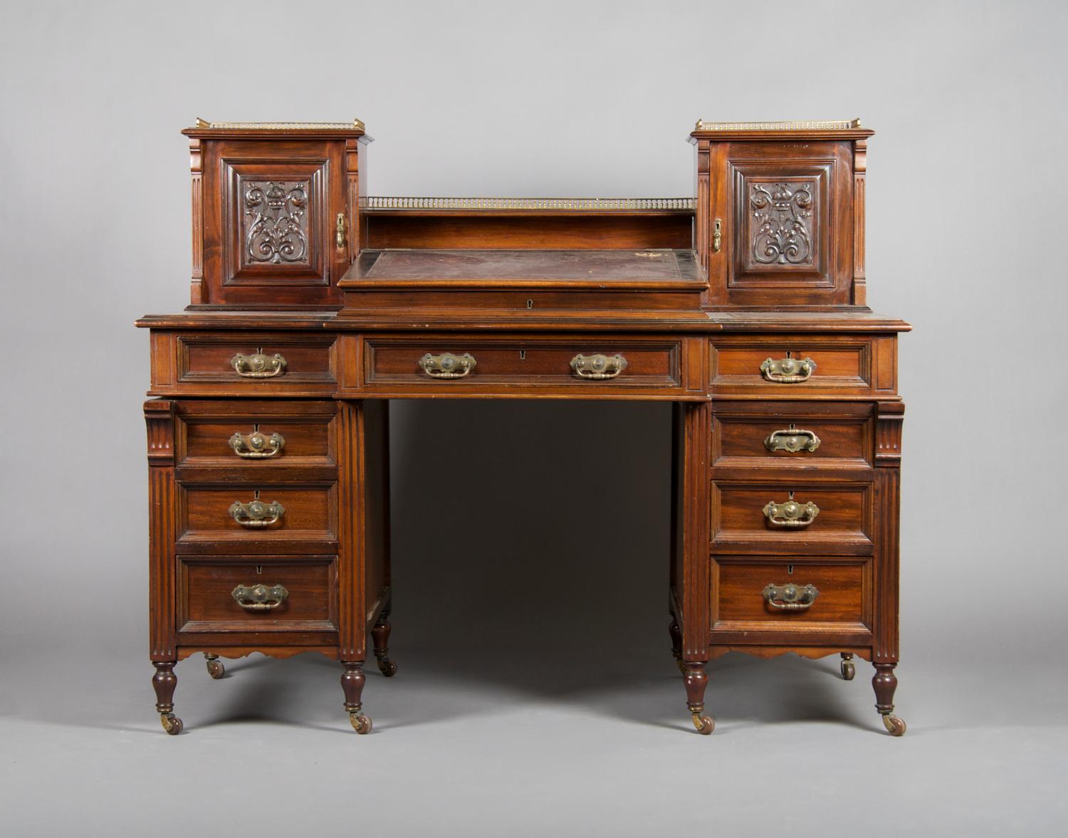 An English Mahogany Pedestal Desk, Hobbs & Co., Height 29 1/2 x width 54 x depth 28 1/4 inches.