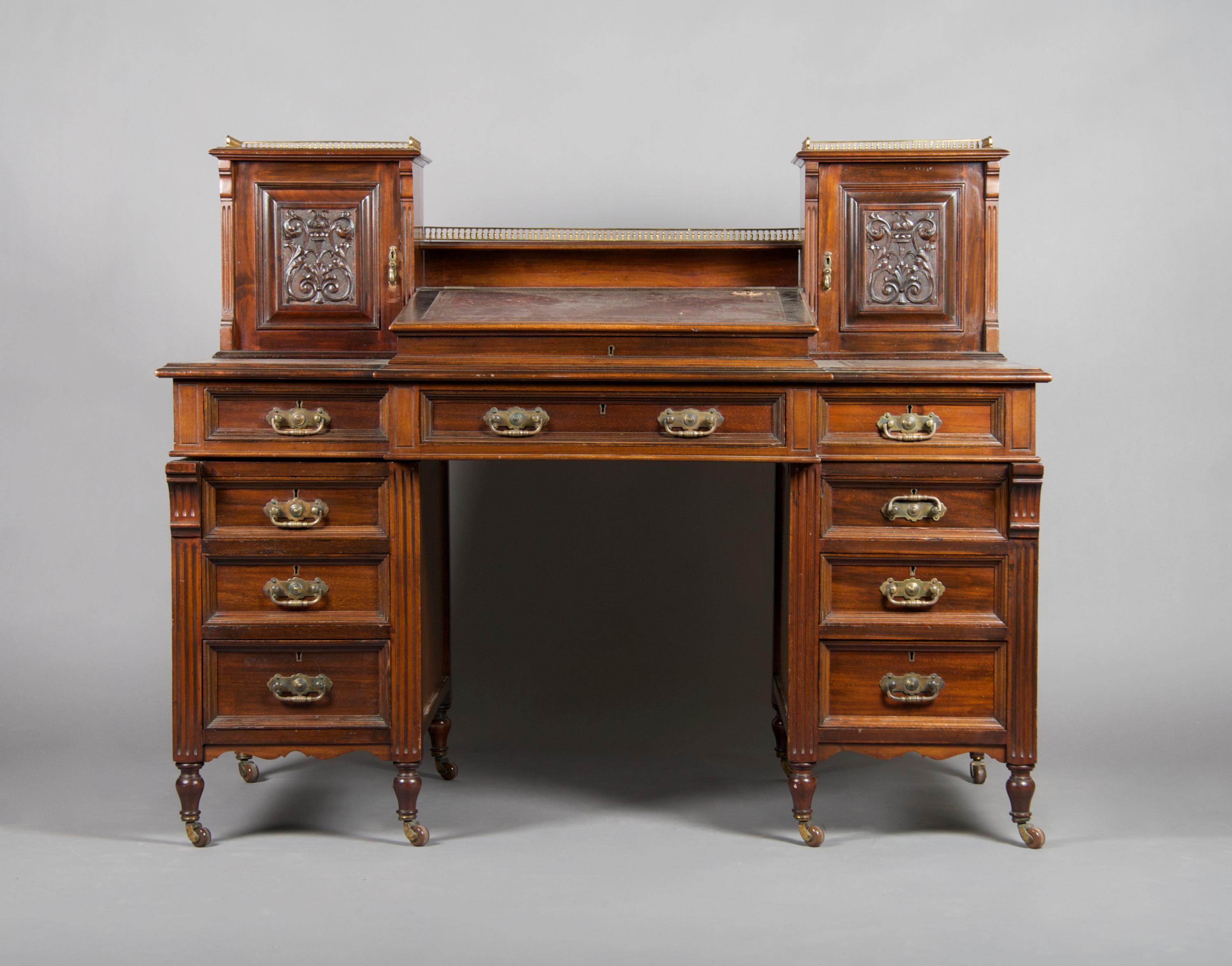 An English Mahogany Pedestal Desk, Hobbs & Co., Height 29 1/2 x width 54 x depth 28 1/4 inches.