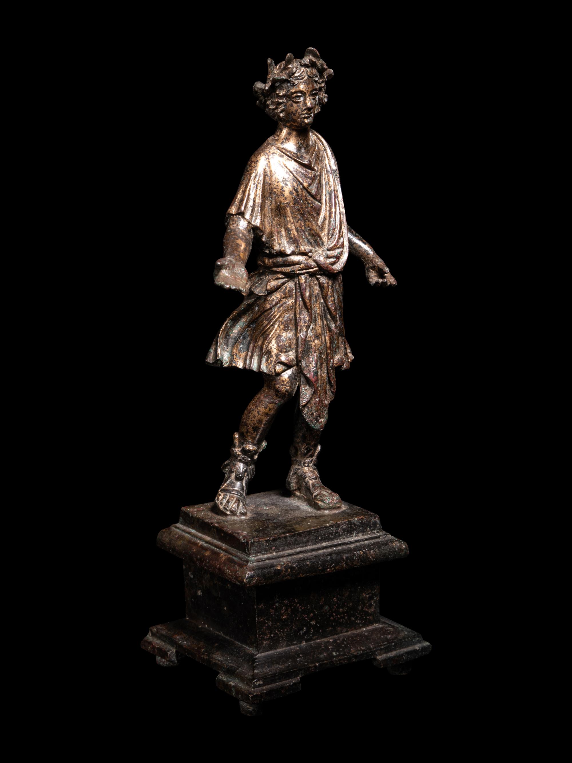 A Roman Gilt Bronze Lar